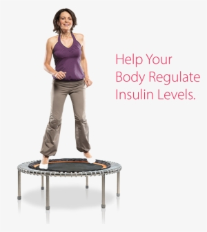 A Woman Bounding On A Bellicon® Mini Trampoline #1206464