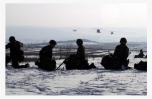 Soldiers Wait On The Snow Covered Ground As Uh-60 Blackhawks - Sea #1688198