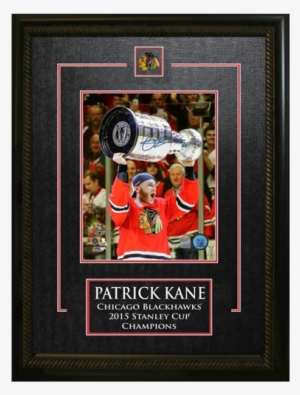 Patrick Kane Autographed 8" X 10" Hoisting Stanley #1841412