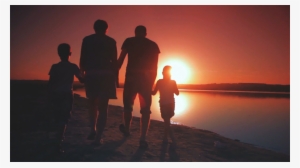 4 Person Family Walking On The Beach Holding #2422844
