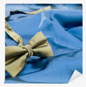 Gold Bow Tie Against Blue Satin Background Wall Mural - Satin #2460821