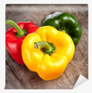 Colored Bell Peppers On Wooden Table Wall Mural • Pixers® - Fruits And Vegetables Website Template #2534561
