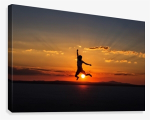 Man Jumping With Joy At Sunset Canvas Print - Sunset #2853988