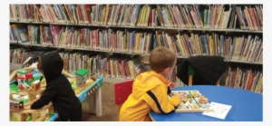 Children Playing In Play Centers At A Library - Child #3702870