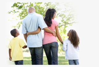 Family Of Four Taking A Walk In The Park #7049396