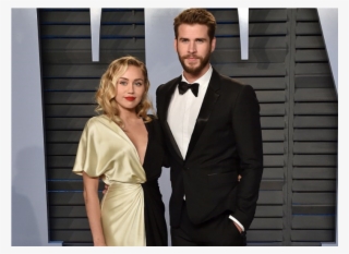 Liam Hemsworth And Miley Cyrus #9608997